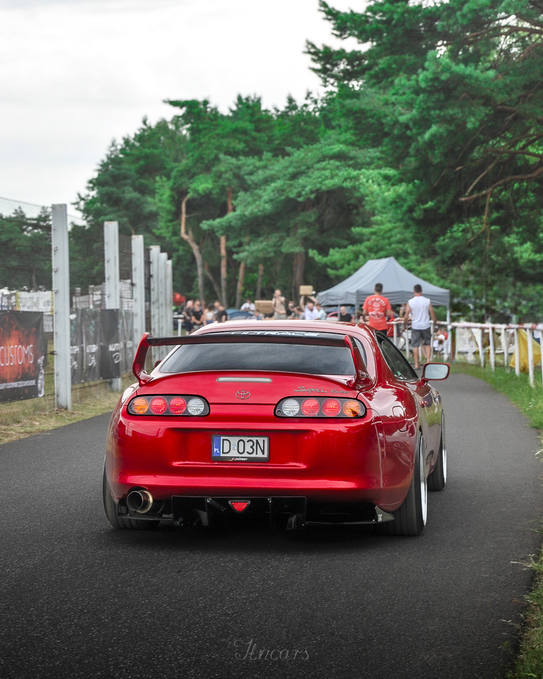 Toyota Supra MK4 Candy Red — JapFest · Tor Poznań